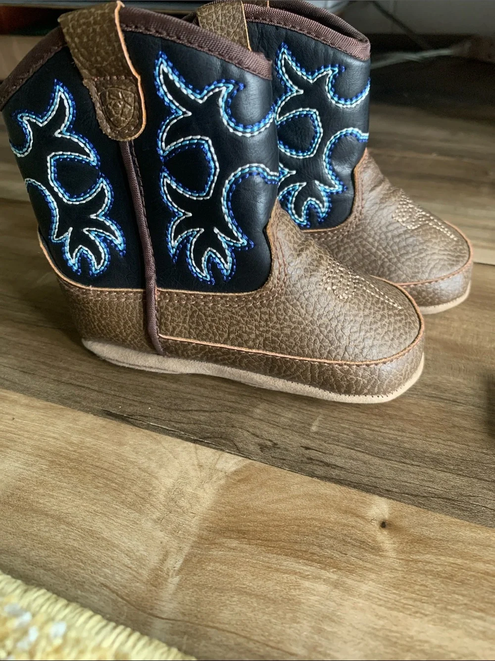 Ariat Brown and Black Kids Cowboy Boots with Blue Stitching